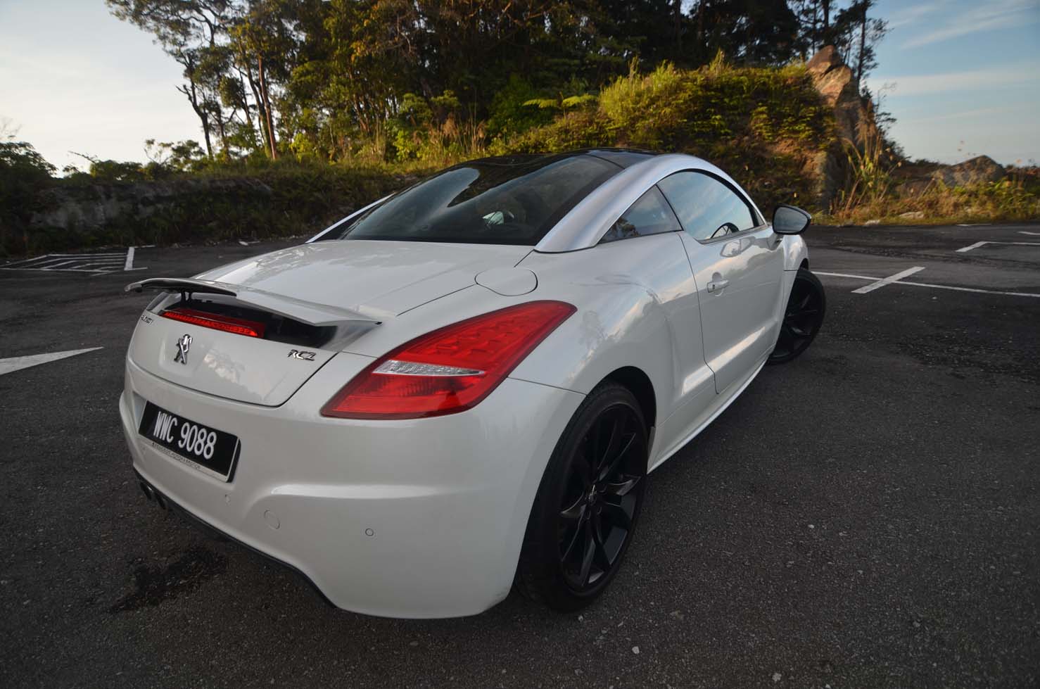 Peugeot rcz coupe modern design sport car parked In city Street Stock Photo